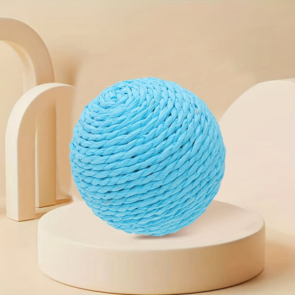 Interactive sound-making cat scratching ball toy made of cardboard material for cats to relieve play with their pet companion.