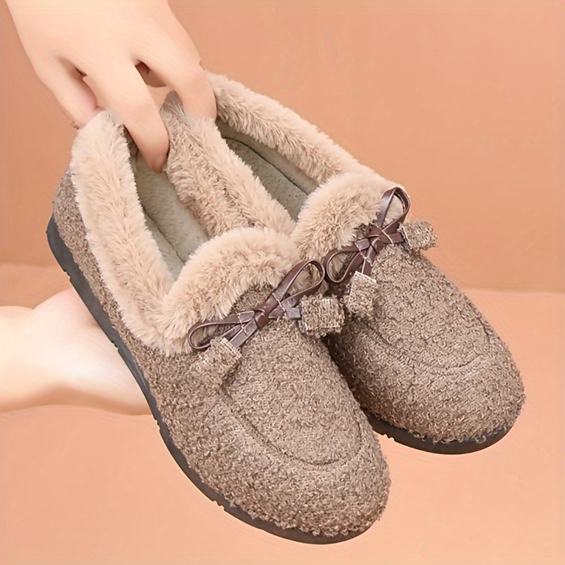 Women's cozy loafers with a solid color design, bow accent, and rubber sole. Made with microfiber upper and lining, flat head for warmth and non-slip comfort. Fashionable and cozy home