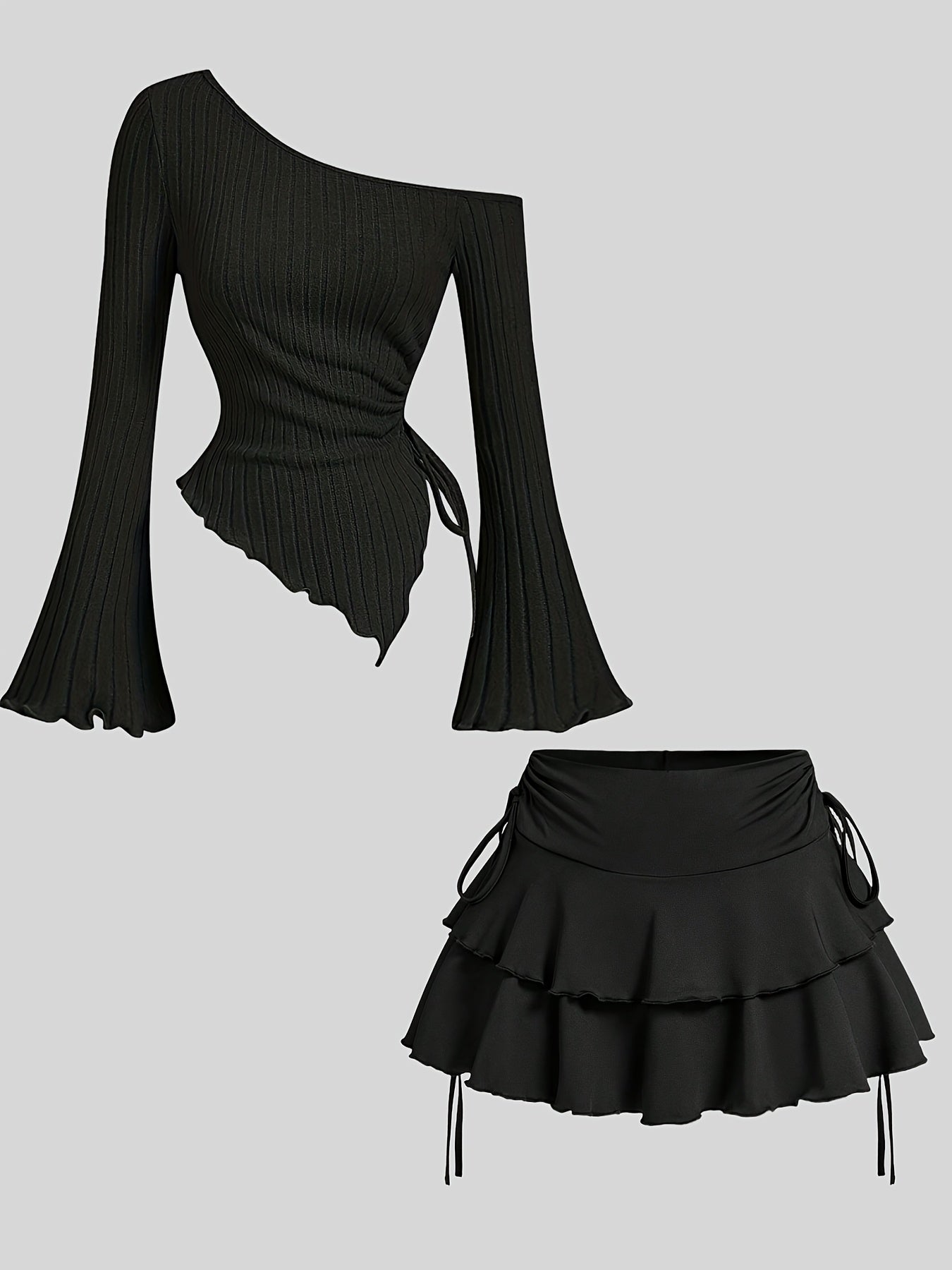 Black polyester knit outfit for spring/summer with off-shoulder top and ruffle skirt.