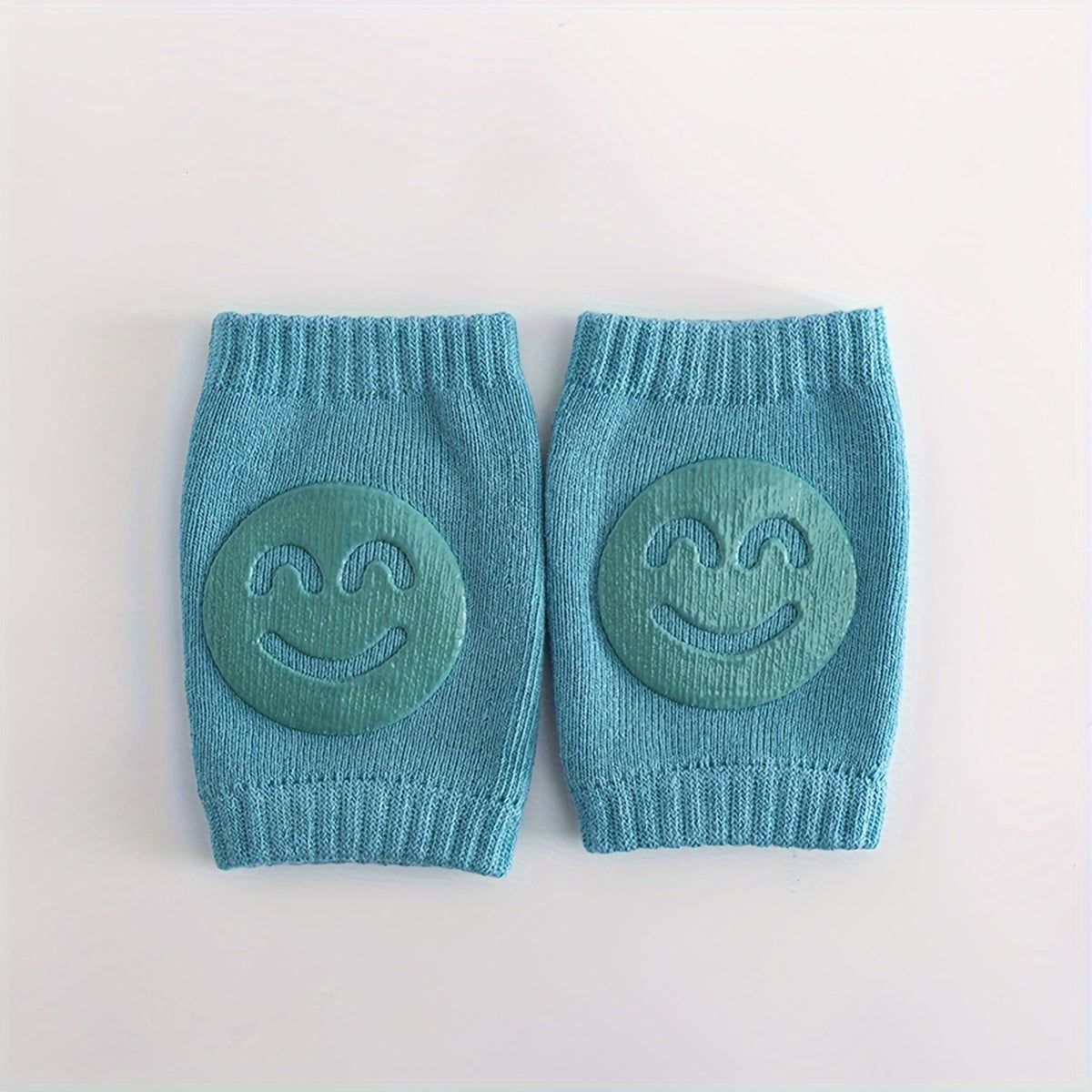 Two pairs of knee pads for toddlers to use while crawling, made from non-slip, phthalate-free polyester material. These elbow and knee protectors are designed for children aged 0-3 years old, providing safety for early walkers with a cheerful happy face