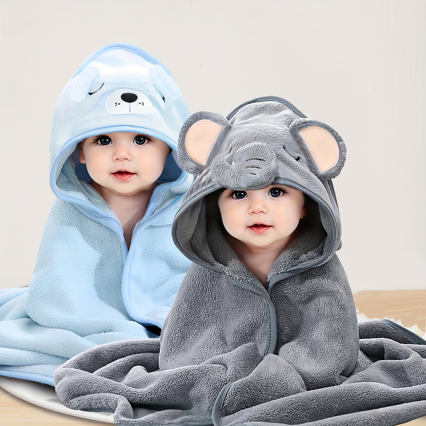 2 Youngsters' cartoon hooded bath towels: Soft, absorbent, and versatile for beach, swimming, and home use.