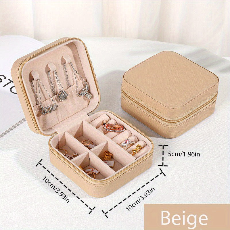 One stylish and portable jewelry box for earrings, rings, and necklaces.