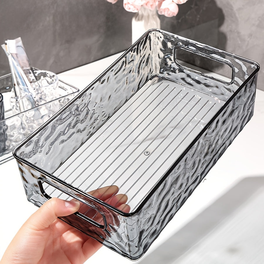 Clear water ripple plastic storage basket perfect for organizing makeup, skincare, snacks, and bathroom accessories. Ideal for back to school and dorm essentials.