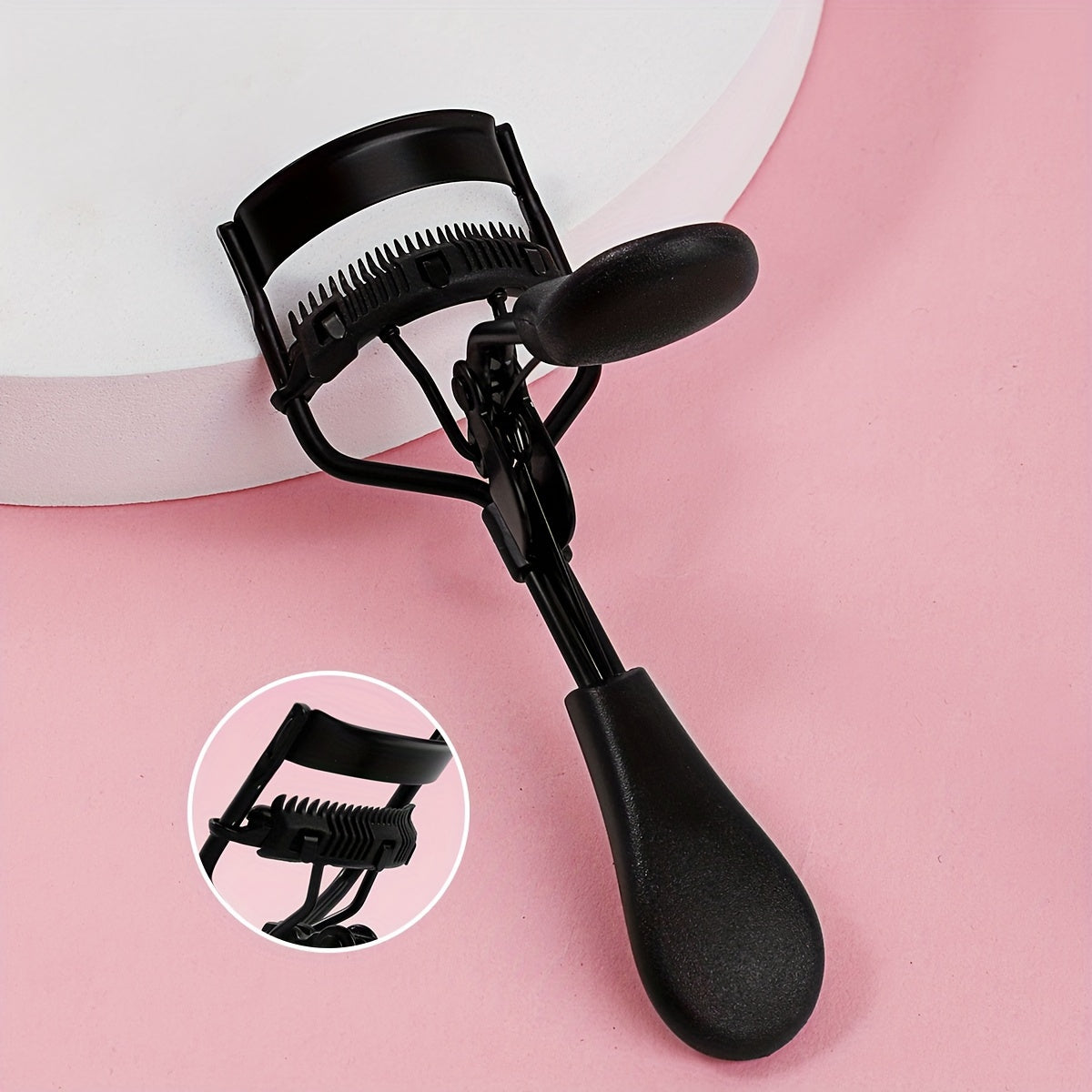 Compact eyelash curler with stainless steel curler and comb for lasting curl, ideal for daily use to enhance lashes.