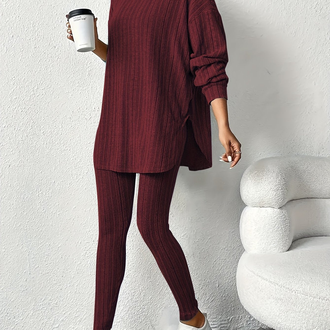 Women's cozy ribbed fleece lounge set featuring a long sleeve hoodie and stretchy leggings ideal for casual home wear in the fall/winter. Made of a comfortable polyester blend with a