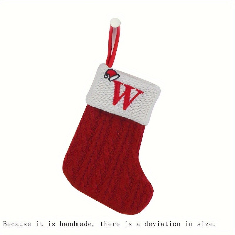 11" Christmas stocking with knitted alphabet design, perfect for hanging on the Xmas tree or using as a gift bag. Made of polyester.