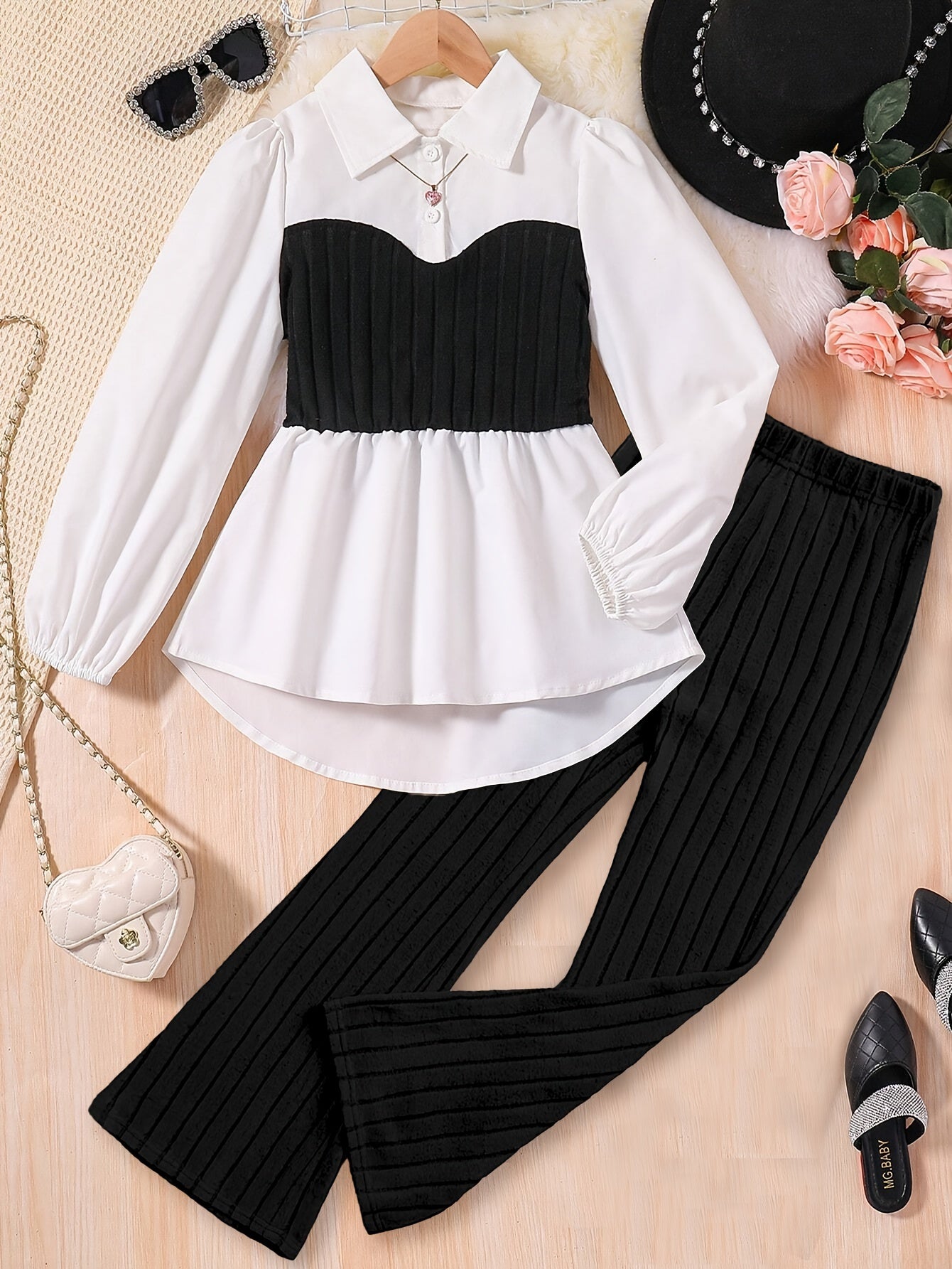 Chic girls' black & white color block long sleeve top and casual pants set made of polyester with button detail, perfect for spring/fall and outdoor wear.