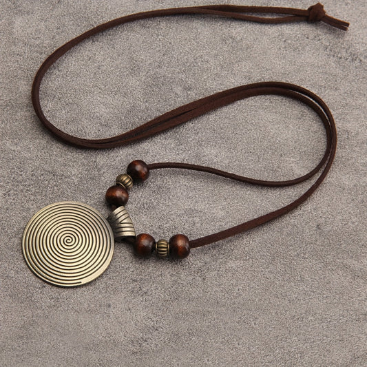 This stylish Vintage Minimalist Wooden Bead Necklace showcases the Twelve Zodiac Signs in a chic striped design. Ideal for trendsetters, this Ethnic-Style Sweater Chain is a perfect gift for moms and educators, adding a touch of flair to everyday outfits.