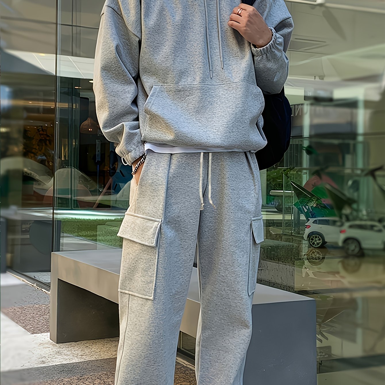 Men's Casual Hooded Sweatshirt and Pants Set made of 100% polyester with a slight stretch knit fabric. Regular fit in solid color perfect for outdoor sports and daily wear. Part of the