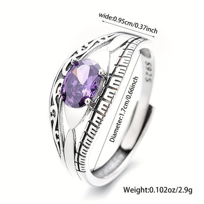 Beautiful and mysterious sterling silver ring with purple waterish zirconia inlay, symbolizing beauty and mystery. This high-quality adjustable ring is perfect for any occasion.