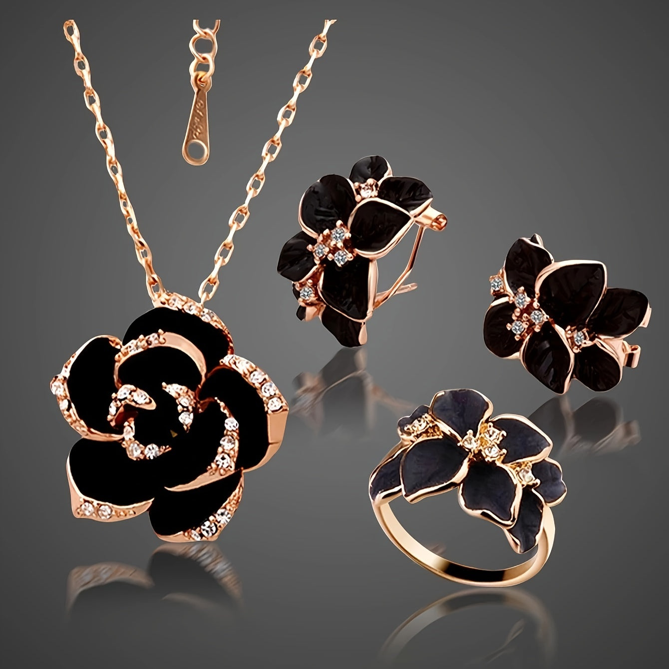 Complete your daily outfits with this stylish jewelry set featuring earrings, a necklace, and a ring. Crafted in 14k gold-plated metal, each piece showcases a sparkling flower design that will surely elevate your party accessories.