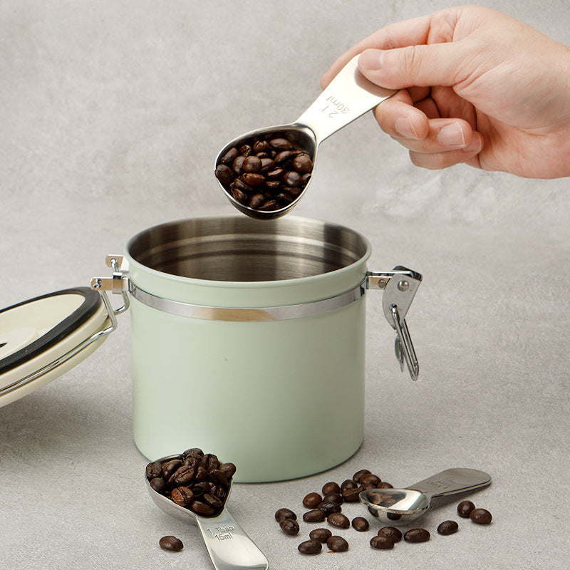 Coffee scoop made of stainless steel with measurement marks - ideal for measuring beans, powder, and baking ingredients.