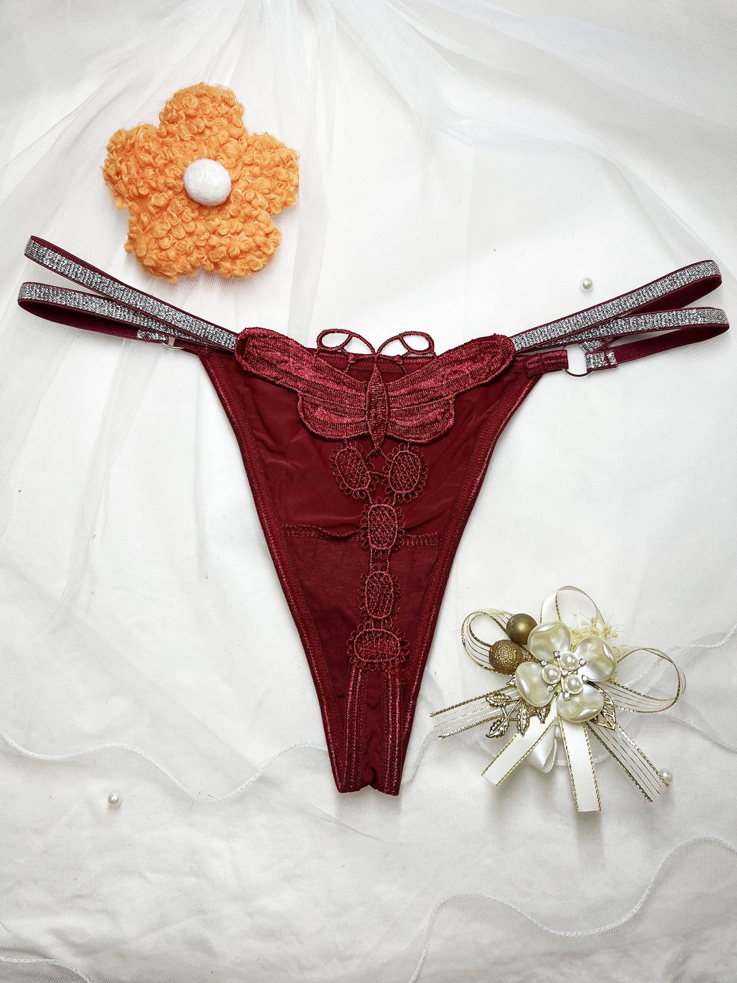 Glittery butterfly embroidered thong pants in two colors with a thin belt