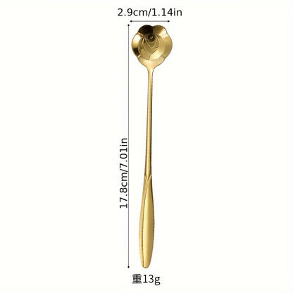 Stylish stainless steel coffee and tea spoon with a golden touch - ideal for espresso, iced drinks, and a must-have kitchen accessory with its long handle.