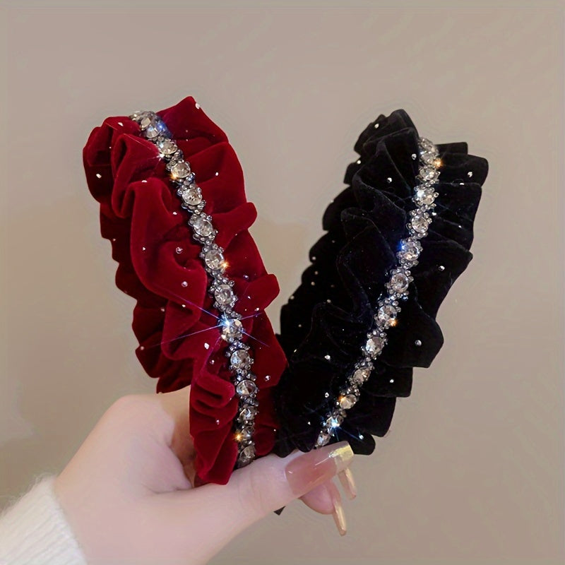 Black velvet headband with rhinestone embellishments, ideal for weddings and formal events.