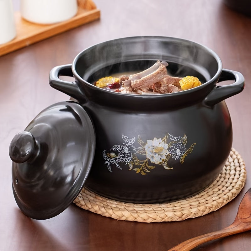 Black ceramic pot with dual handles, holding up to 71oz - suitable for high and low temperatures. Designed for 2-3 people, perfect for home kitchens.