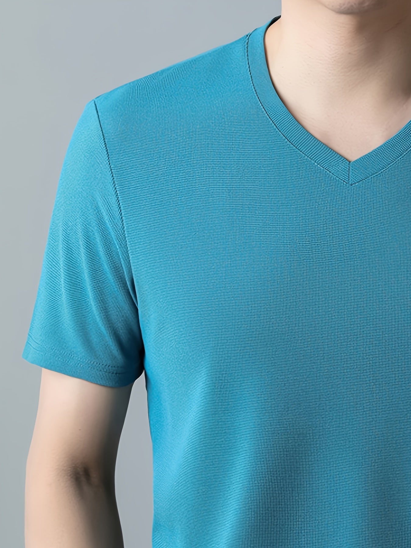 Men's casual short sleeve V-neck tee for summer outdoor wear.