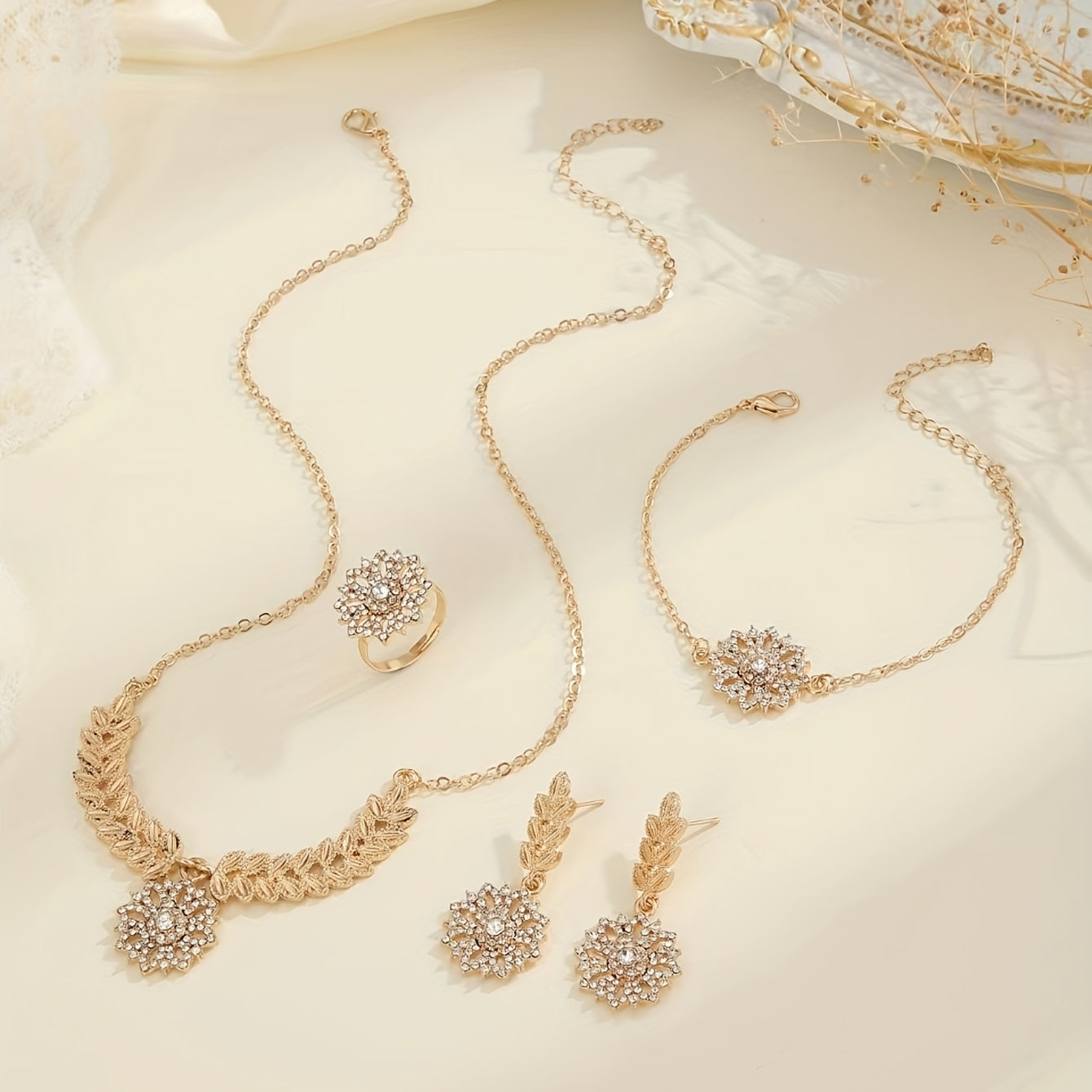 Set of 5 Bohemian Floral Jewelry pieces, including Vintage Rhinestone Greek Goddess Golden Leaf Earrings, Bracelet, Ring Set. Made of Zinc Alloy, this is the perfect All-Season Gift for Women.