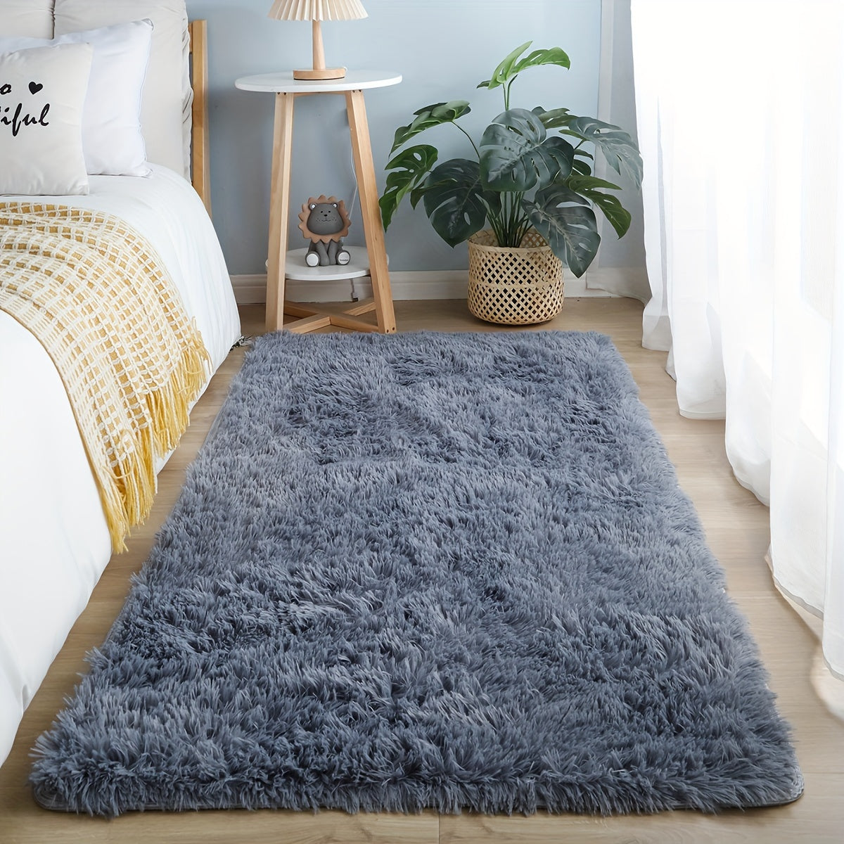 Soft area rug with tie-dye design, perfect for your bedroom or living room. This washable patio mat is ultra fuzzy and adds a decorative touch to any space. It is also suitable for use as a bedside accessory, in a cloakroom, or on a coffee table.