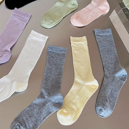 4 pairs of comfy mid-tube socks for women, with hollow out design for breathability.