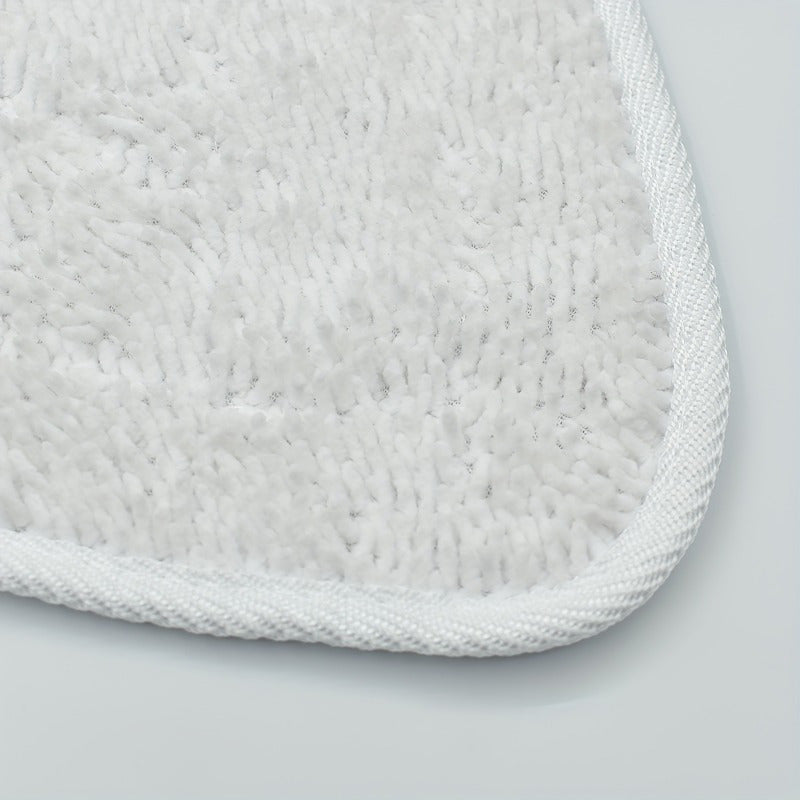 Two microfiber steam mop pads in a triangle shape, designed for use with Vileda 100 models. These pads have a high absorption capacity, are reusable, machine washable, and are perfect for cleaning floors as an attachment accessory.