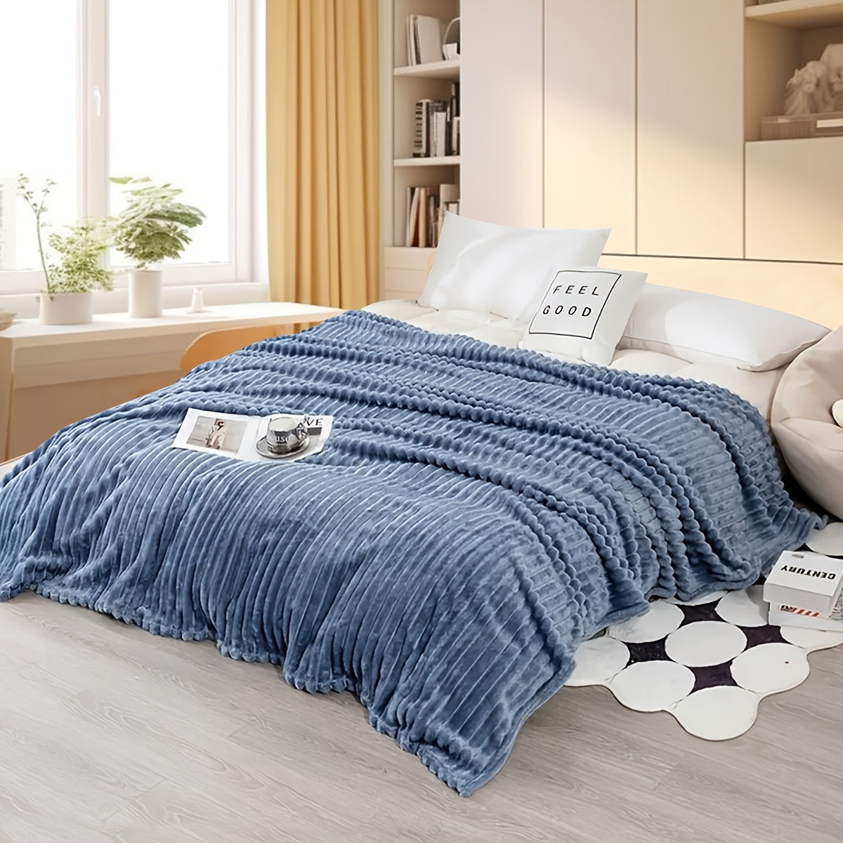 Upgrade your comfort with this dual-sided striped fleece throw blanket. The ribbed texture adds a touch of luxury, while the cozy and warm material makes it perfect for any season. Whether you use it for naps, in the office, or in the bedroom, this