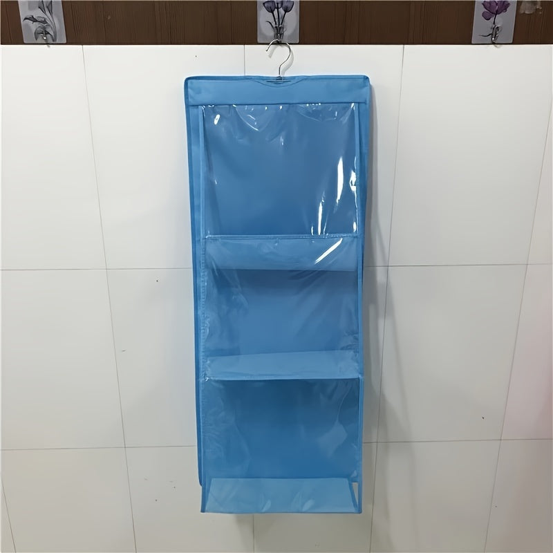 Non-woven fabric hanging storage bag for bags, dustproof multi-layer organizer for home use.