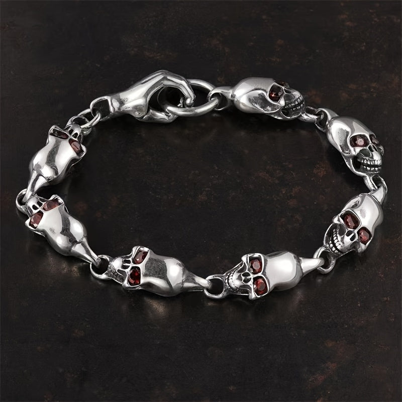 Vintage-inspired 925 sterling silver Gothic skull bracelet featuring a striking red eye charm. This adjustable punk style jewelry is ideal for couples and is perfect for daily wear and music festivals.