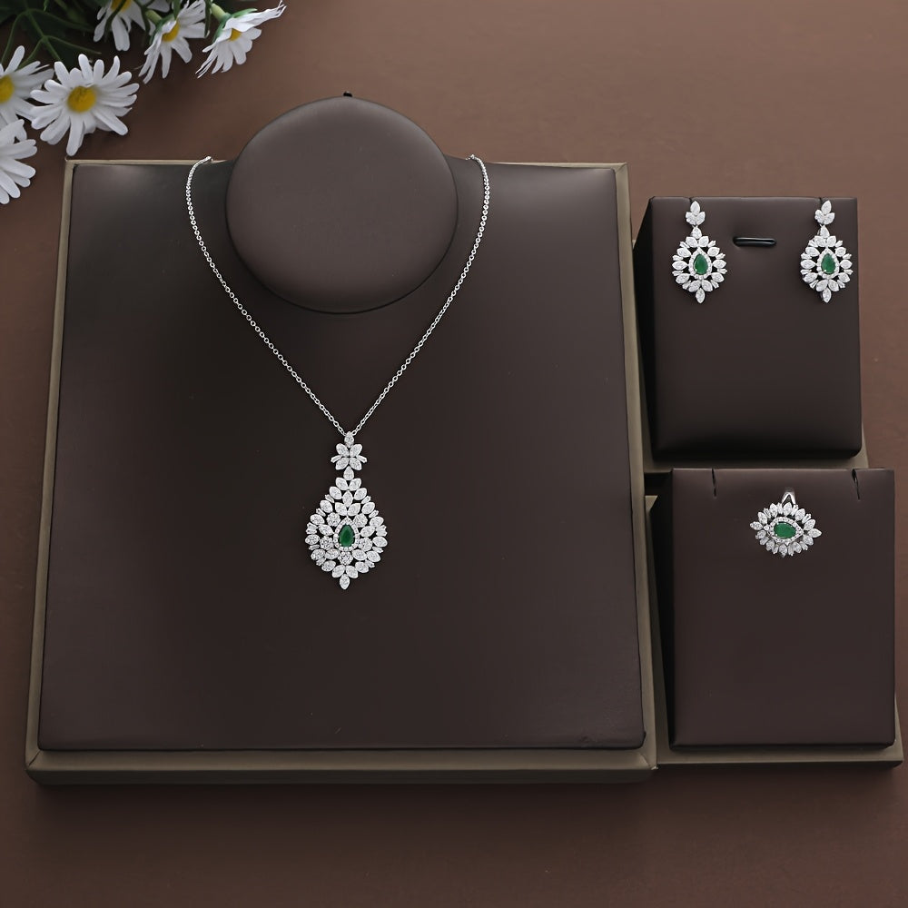 This Valentine's Day gift set includes a beautiful 925 silver chain with a vintage leaf design, a lovely water drop turquoise pendant, and a sturdy necklace, earrings, and ring set for women to wear during the holiday season.