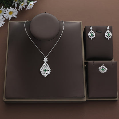 This Valentine's Day gift set includes a beautiful 925 silver chain with a vintage leaf design, a lovely water drop turquoise pendant, and a sturdy necklace, earrings, and ring set for women to wear during the holiday season.