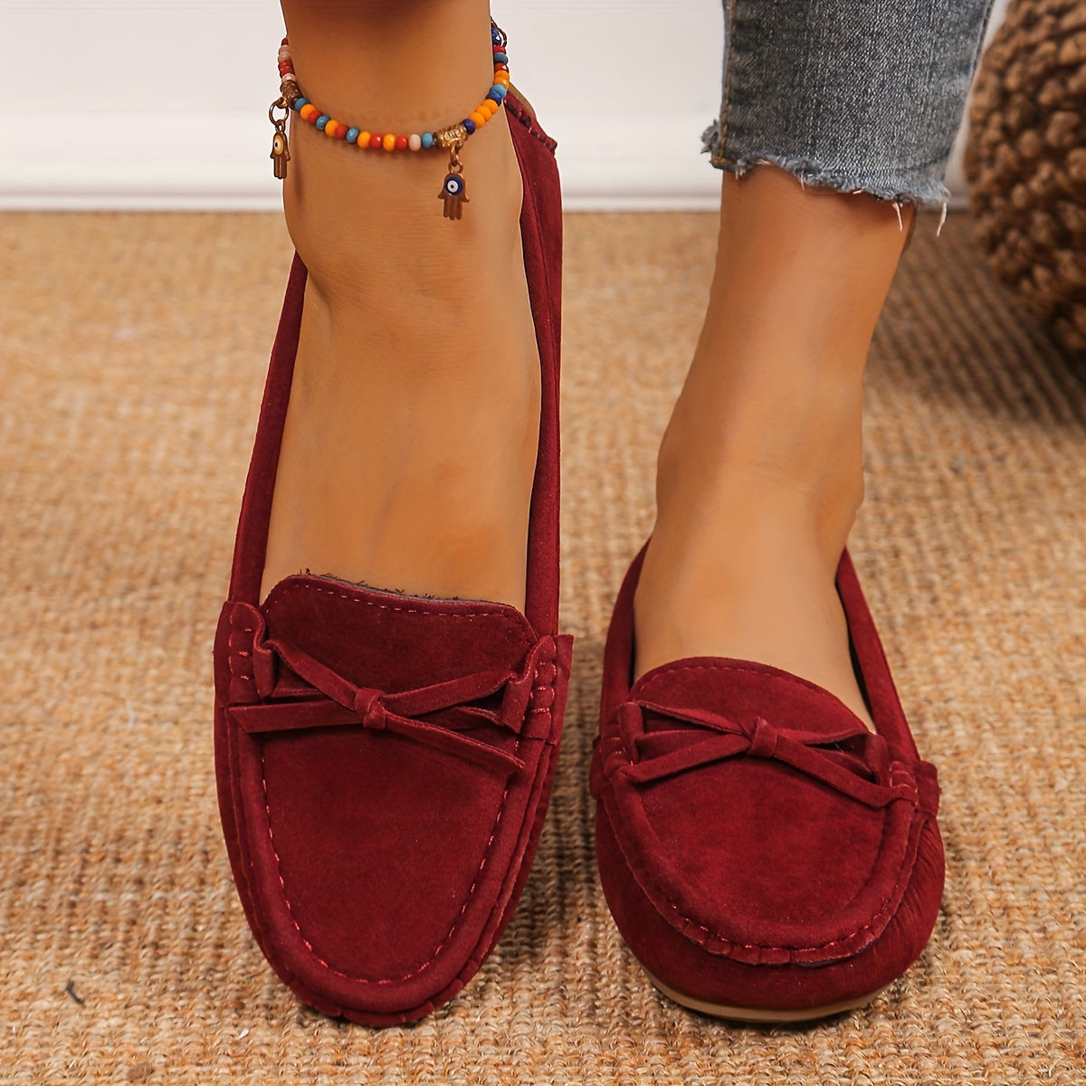 Retro flat loafers with bow detail, slip on style, and soft sole for casual wear.