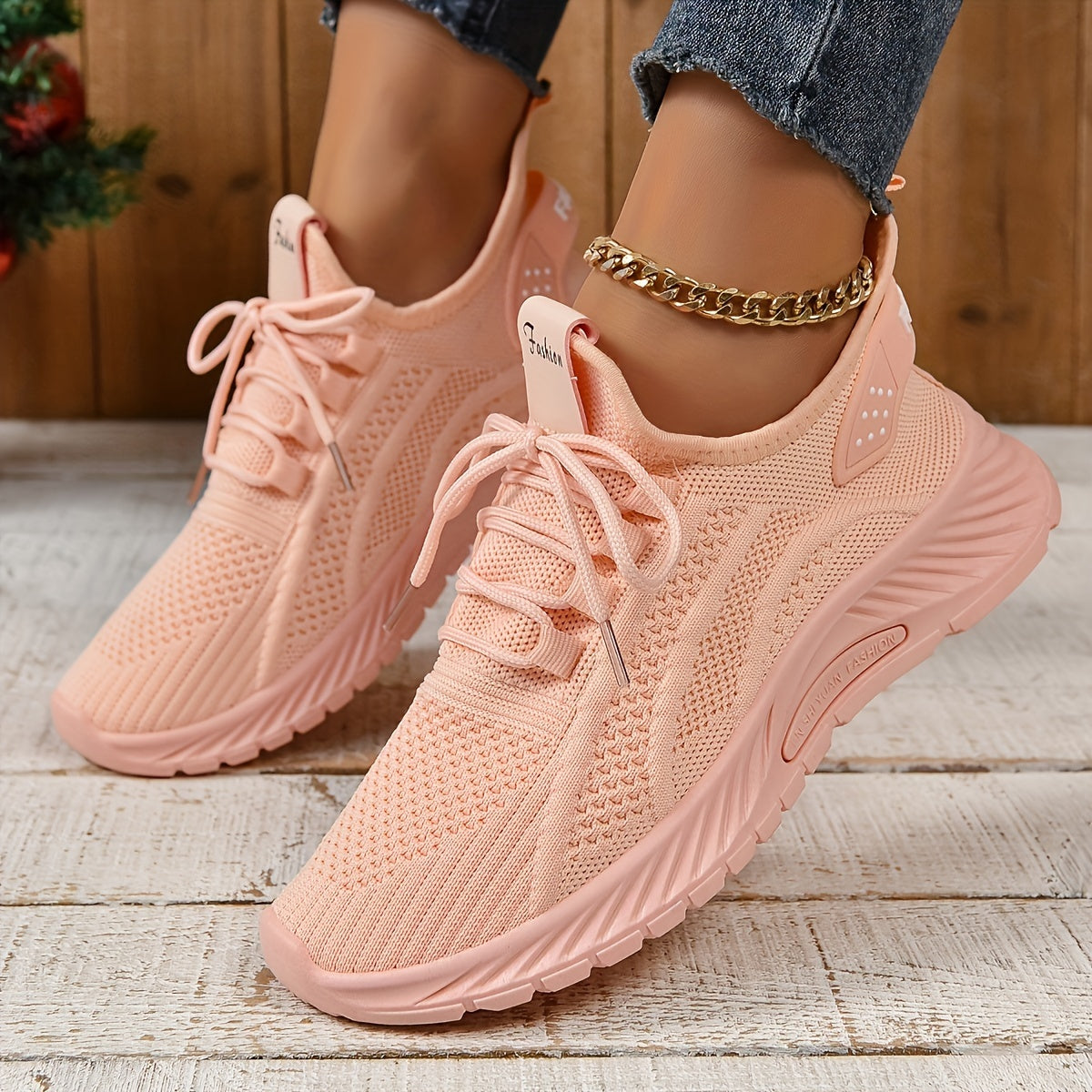 Trendy white knit fabric sneakers for women with EVA sole and breathable lace-up design, suitable for all seasons. Lightweight and stylish.