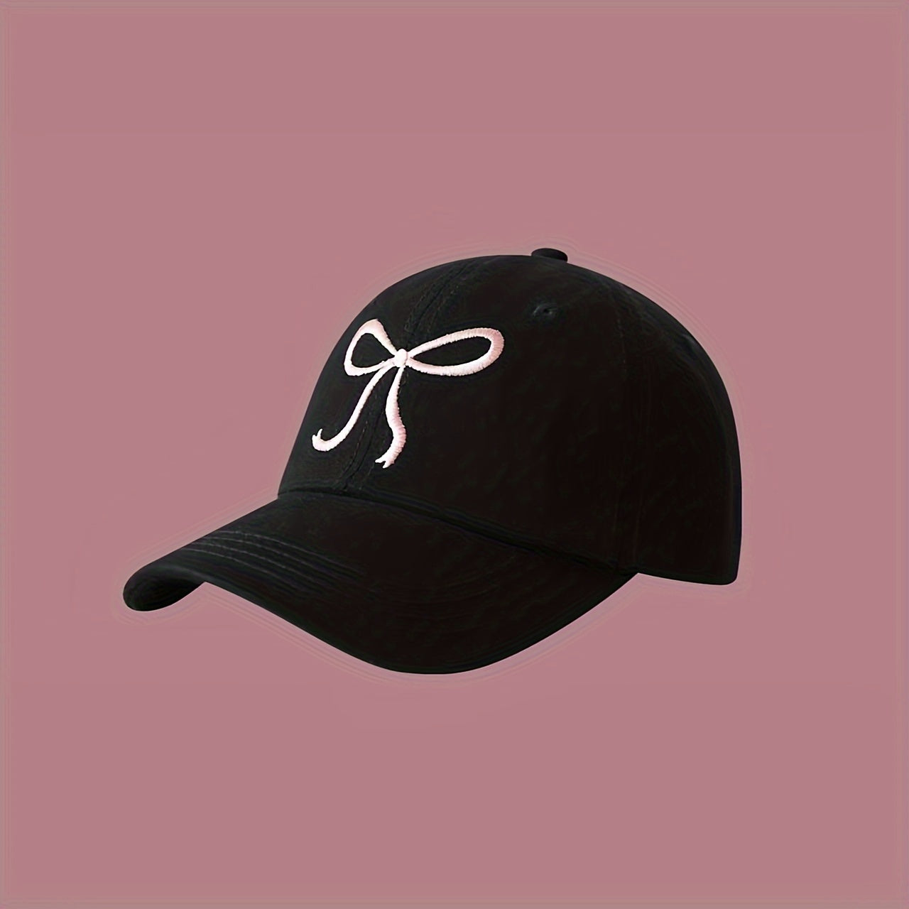 Adjustable bowknot baseball cap in sweet pink design, made of lightweight polyester. Comes in black, grey, apricot, and pink for casual wear.