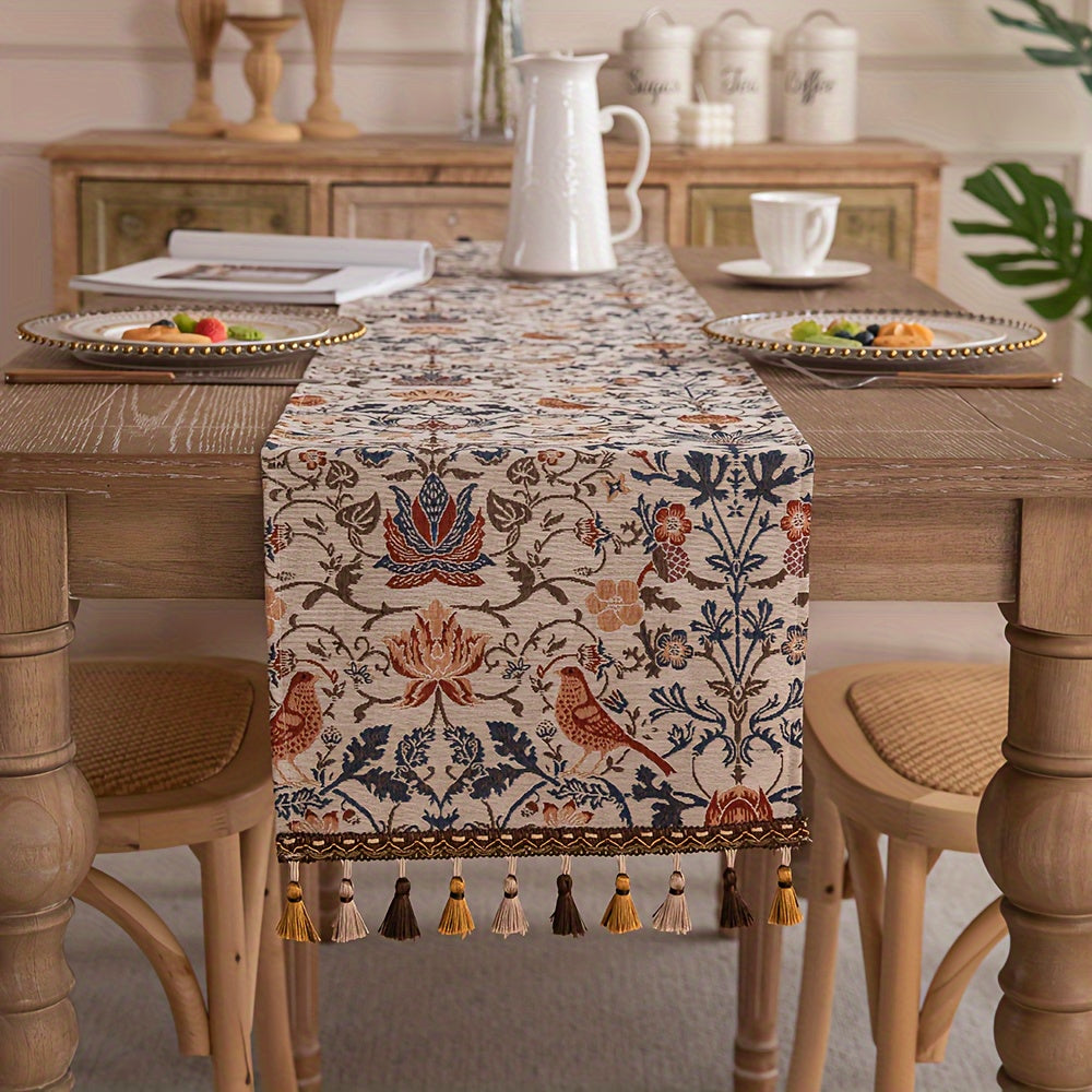 Vintage floral and bird jacquard table runner with tassels in rustic countryside style. Made of polyester, 33cm wide. Ideal for dining, coffee, and tea tables. Vintage design with polyester fabric.