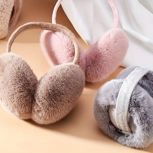 Ear warmers made of winter fleece with a furry lining for extra warmth and comfort. These earmuffs are foldable and perfect for cold weather.