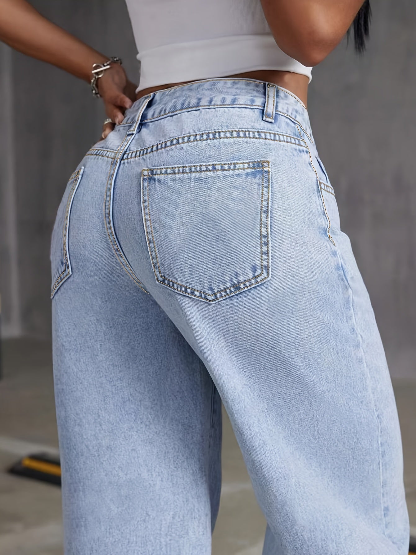 Women's high waist wide leg jeans with button fly, all-season solid color, slight stretch fabric. Made of 70% cotton, 27% polyester, 2% spandex. Features long length and washed finish.