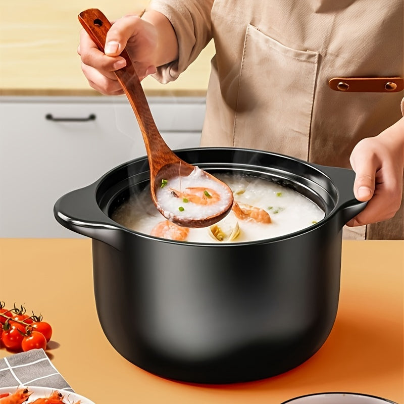 A versatile 5-liter black ceramic stockpot featuring a vibrant yellow lid - perfect for preparing stews, soups, and pot roasts at high temperatures. This multi-functional, heat-resistant, non-stick stockpot is suitable for use on open fires and electric