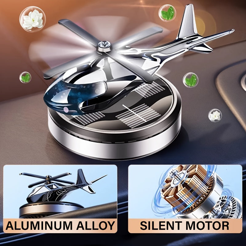 Solar-powered helicopter air freshener with rotating aluminum alloy aroma diffuser, paired with paper fragrance sheets for long-lasting scent. Silver car decoration that does not require