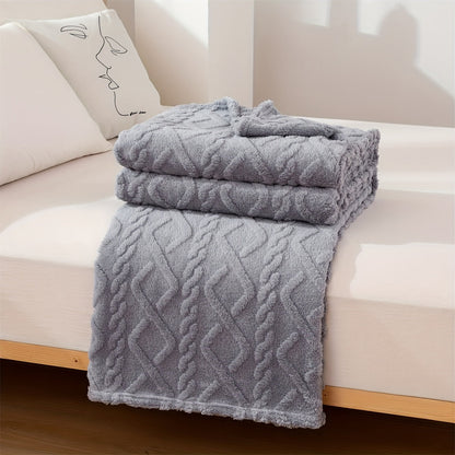 A cozy and versatile blanket with a sweater-like embossed design, perfect for New Year's, Chinese New Year, Valentine's Day, Mother's Day, and back-to-school occasions.