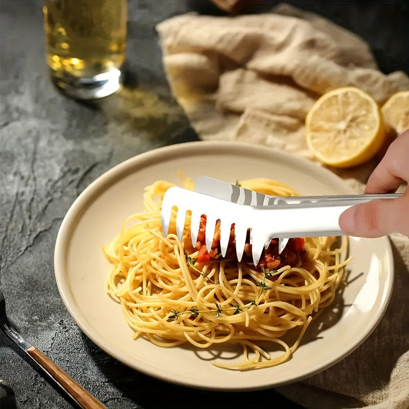 Durable stainless steel pasta tongs for restaurant and home use.