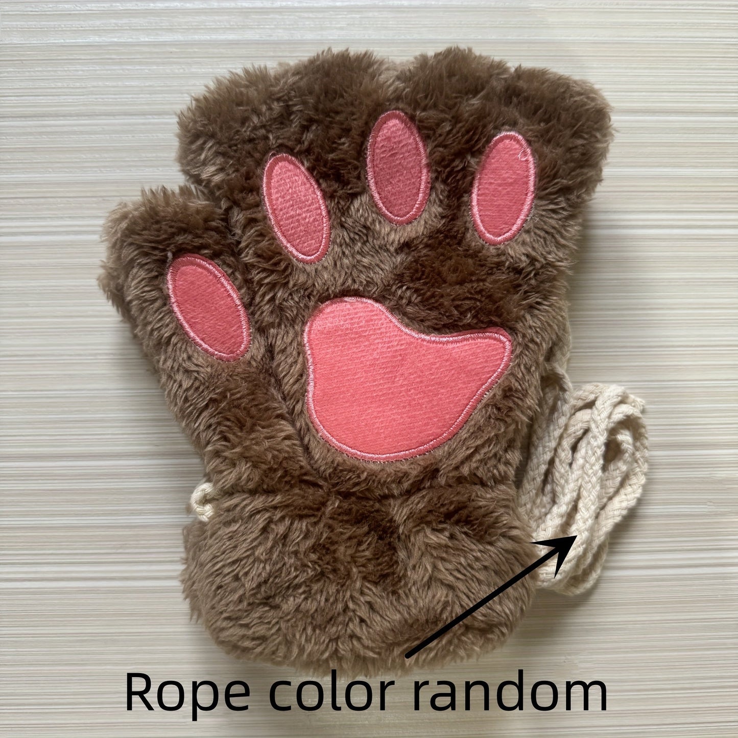 Stylish and cozy, these Cute Cat Claw Plush Gloves provide warmth and comfort in the cold seasons. The half finger design adds a trendy touch to these thick, fuzzy gloves, making them perfect for autumn and winter.