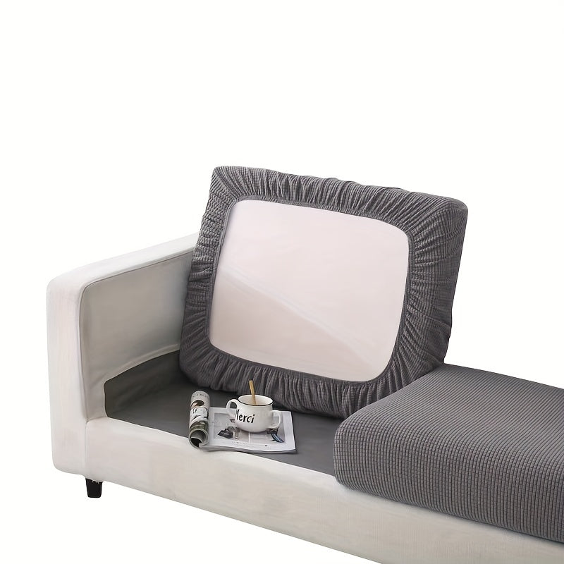 Modern Stretch Sofa Cover made of polyester and spandex blend. Machine washable with elastic band closure. Integrated design fits most sectional sofas in the living room.