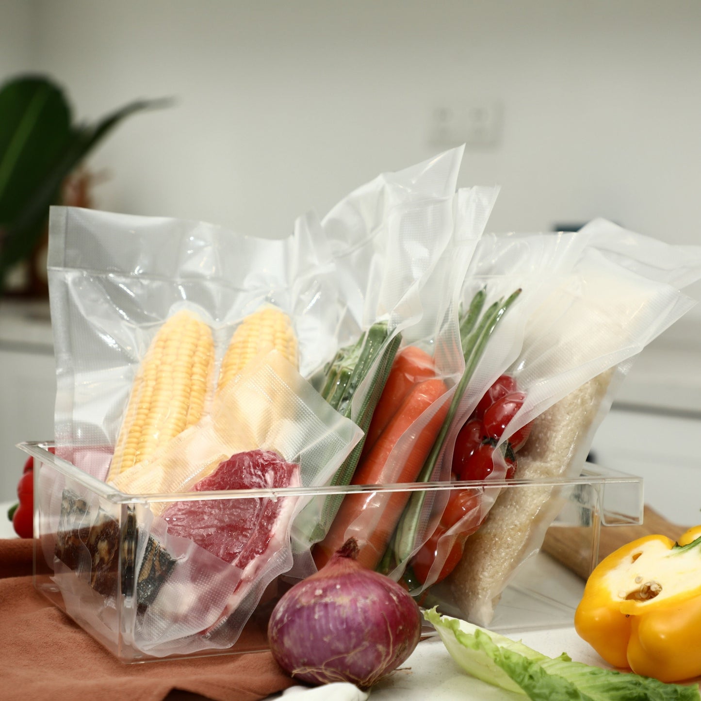 2 Rolls of Vacuum Bags for food preservation, featuring Food Savor bags and vacuum packaging for use with vacuum sealer machines. Also suitable for Sous Vide cooking, these Home Kitchen Supplies include Kitchen Accessories for convenient food storage.