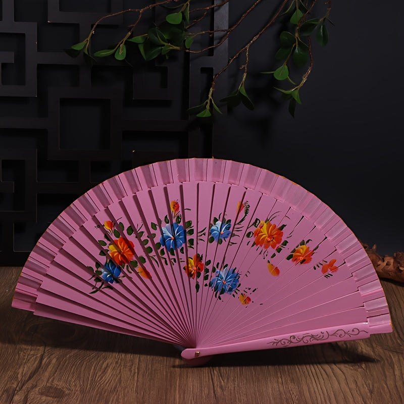 Wooden Spanish folding fan for dancing and home decoration with printed design, conveniently folds for easy storage.