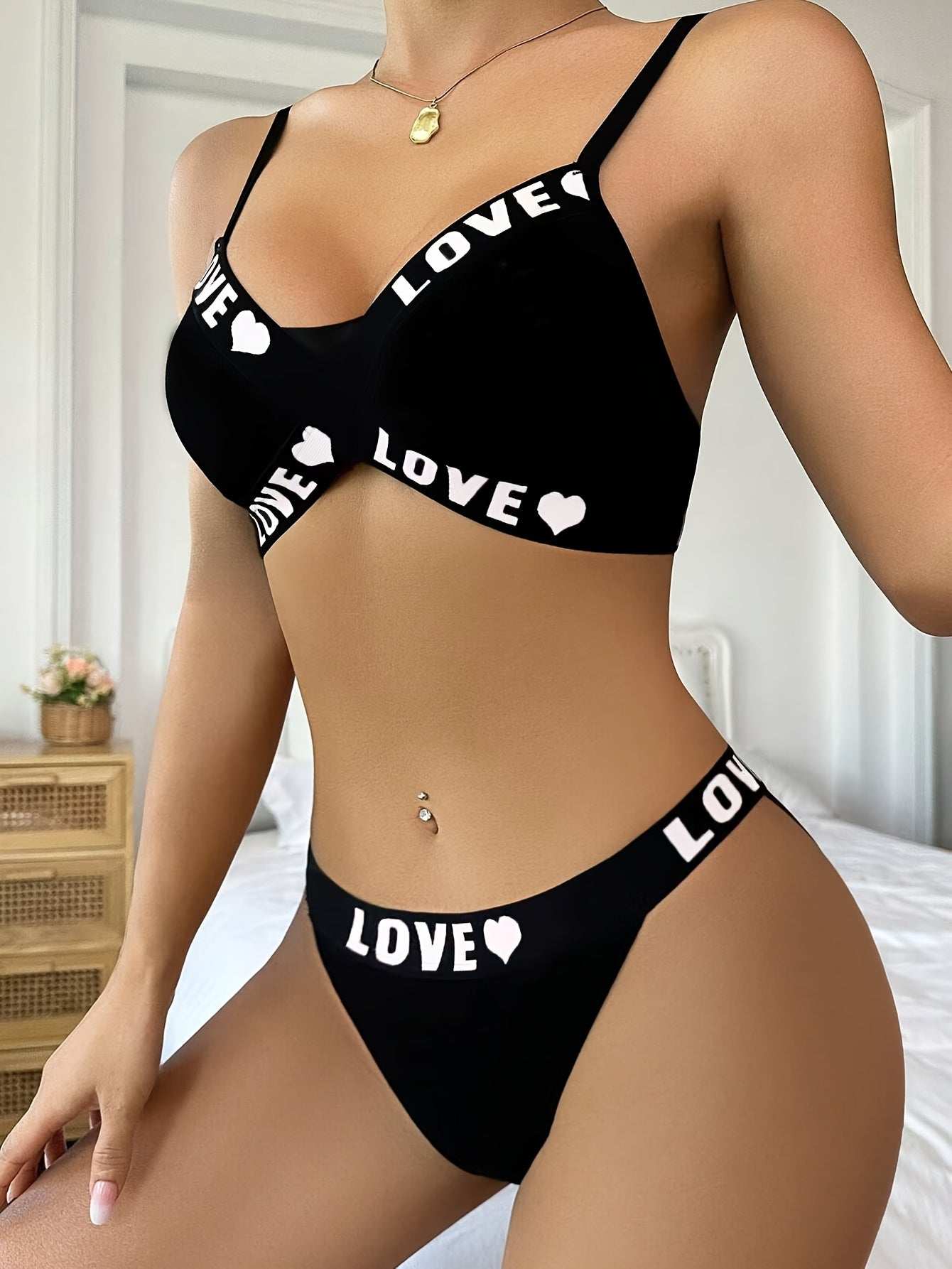 Medium-support bikini set for women with letter print, made of non-transparent knit fabric that is hand washable.