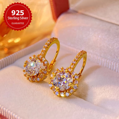 These elegant earrings feature two dazzling 1CT Moissanite round stones set in 925 sterling silver, with a total weight of approximately 2.91 grams. Perfect for weddings or as a luxurious Valentine's Day gift for your beloved.