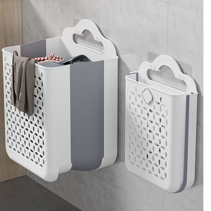 Contemporary wall-mounted laundry basket made of durable plastic with handles. Measures 39x27x19cm and is foldable for easy storage. Can be used as a bathroom organizer or multipurpose hollow bucket for toys, snacks, fruits, and vegetables. Features a