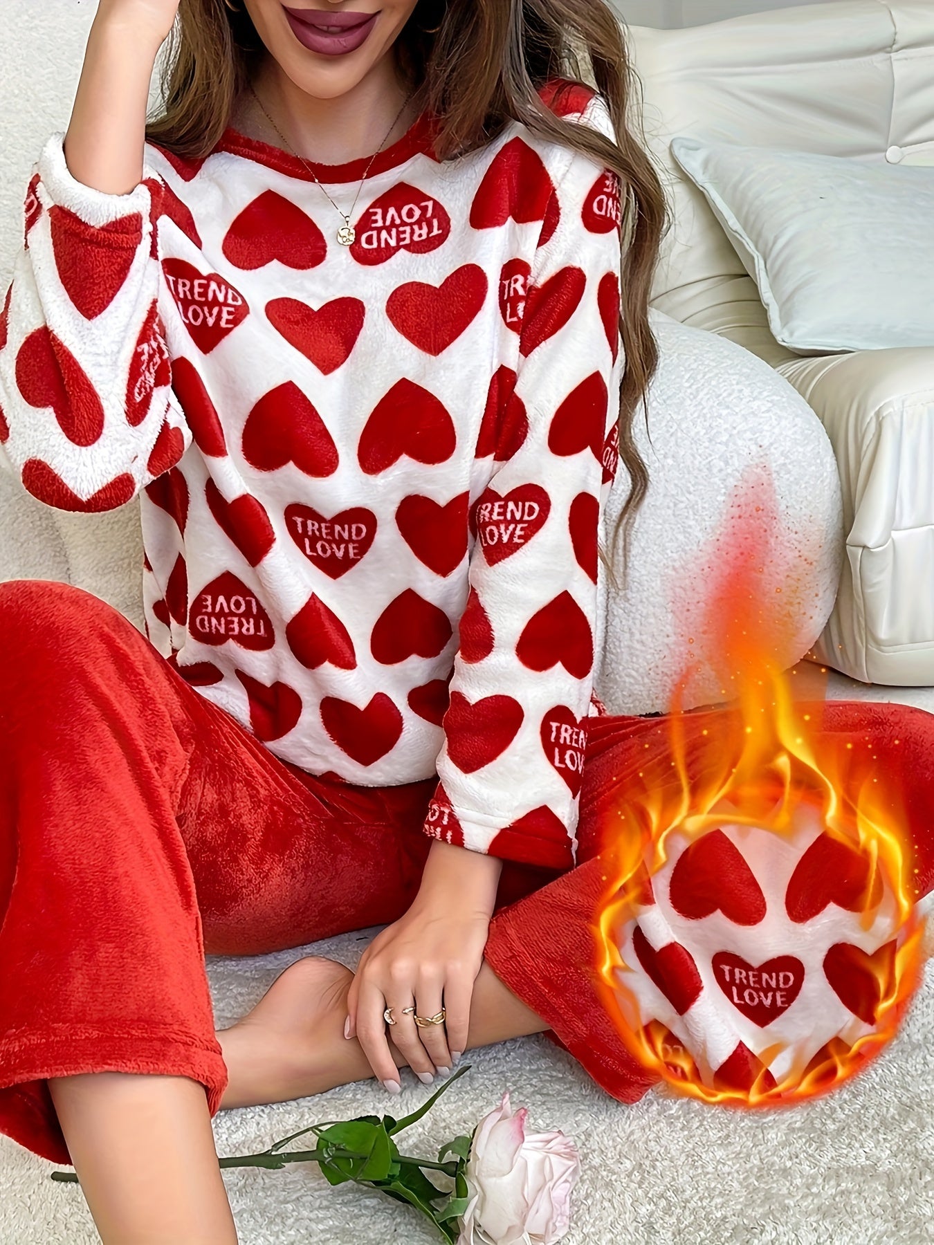 Cozy lounge set for women featuring heart and letter print, perfect for fall and winter. Includes long sleeve top and pants with a relaxed fit.