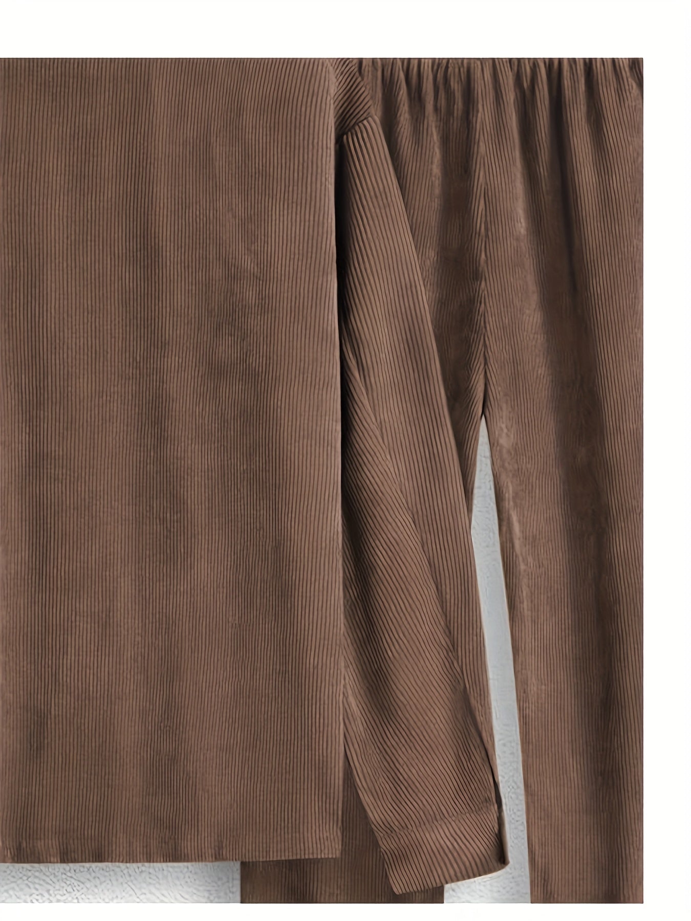 OBM Men's Casual Set includes a solid brown jacket and pants made of machine washable, non-stretch polyester fabric. Ideal for outdoor leisure activities in fall/winter. Unreviewed.