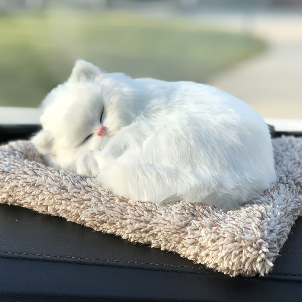 Fluffy sleeping cat figurine.